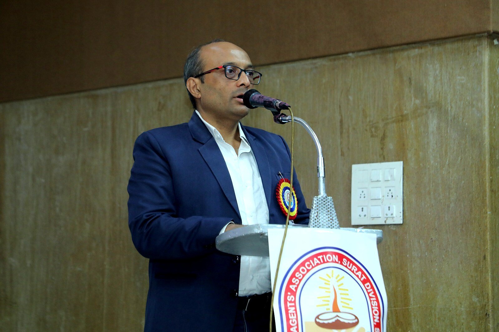 Speaker at LICAAS podium